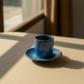 Eternal Pottery artisan ceramic espresso cup and saucer set in deep  blue with glossy finish.