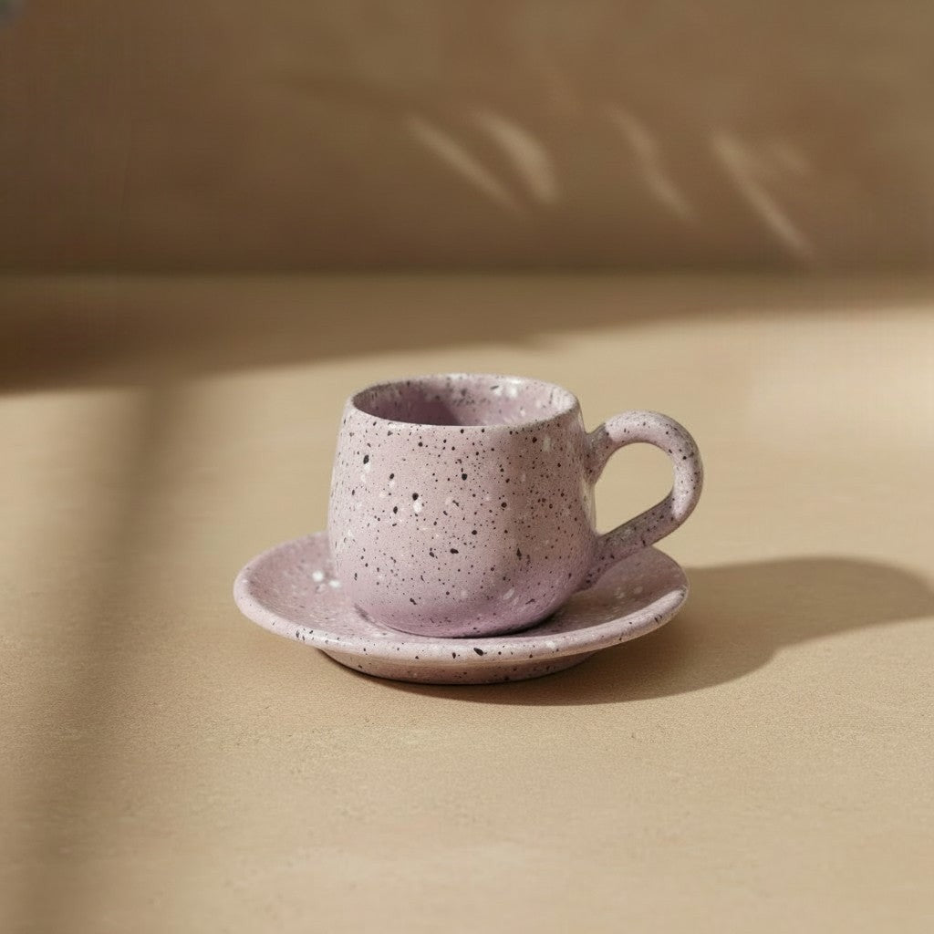 Eternal Pottery pink speckled ceramic espresso cup and saucer set, perfect for a rich espresso shot.